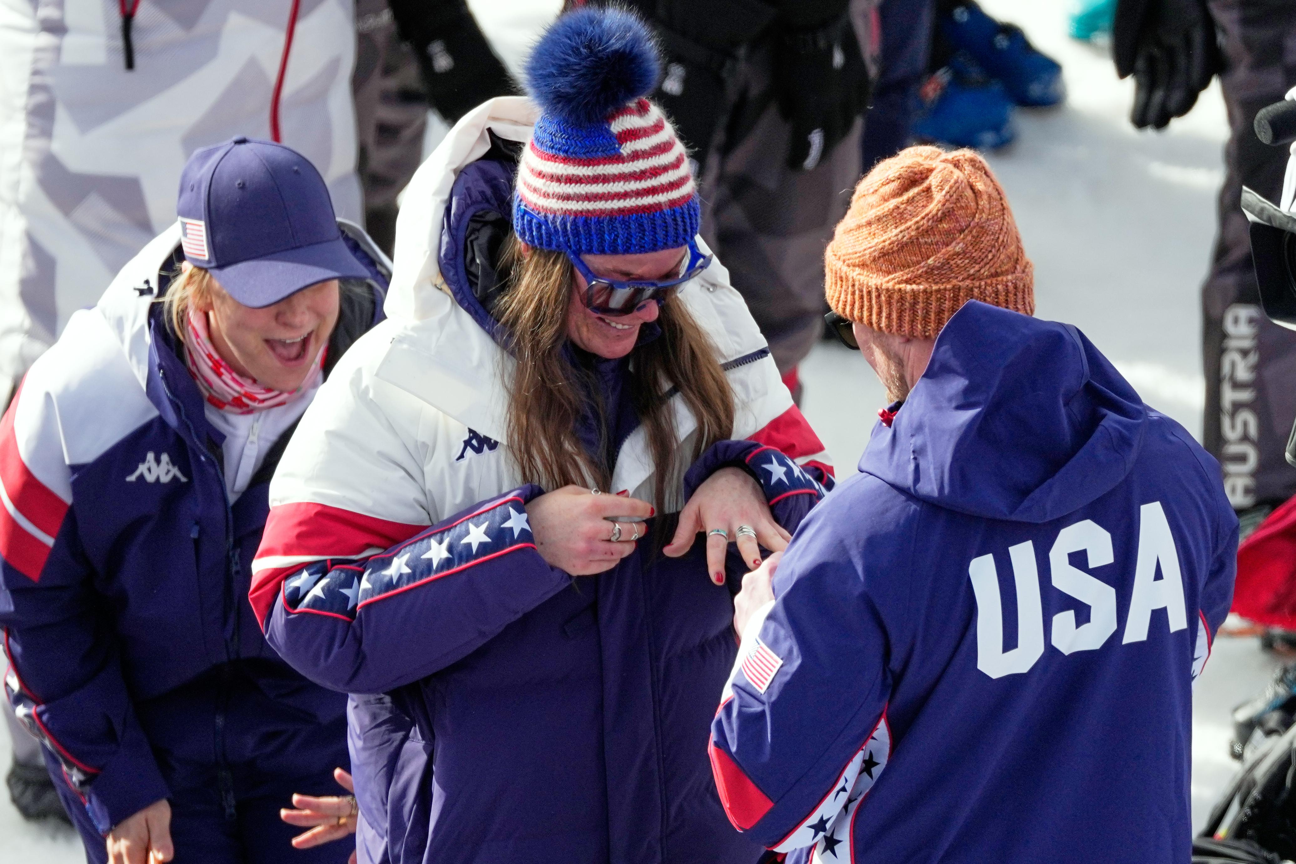 United States’ Breezy Johnson looks at the engagement ring she...
