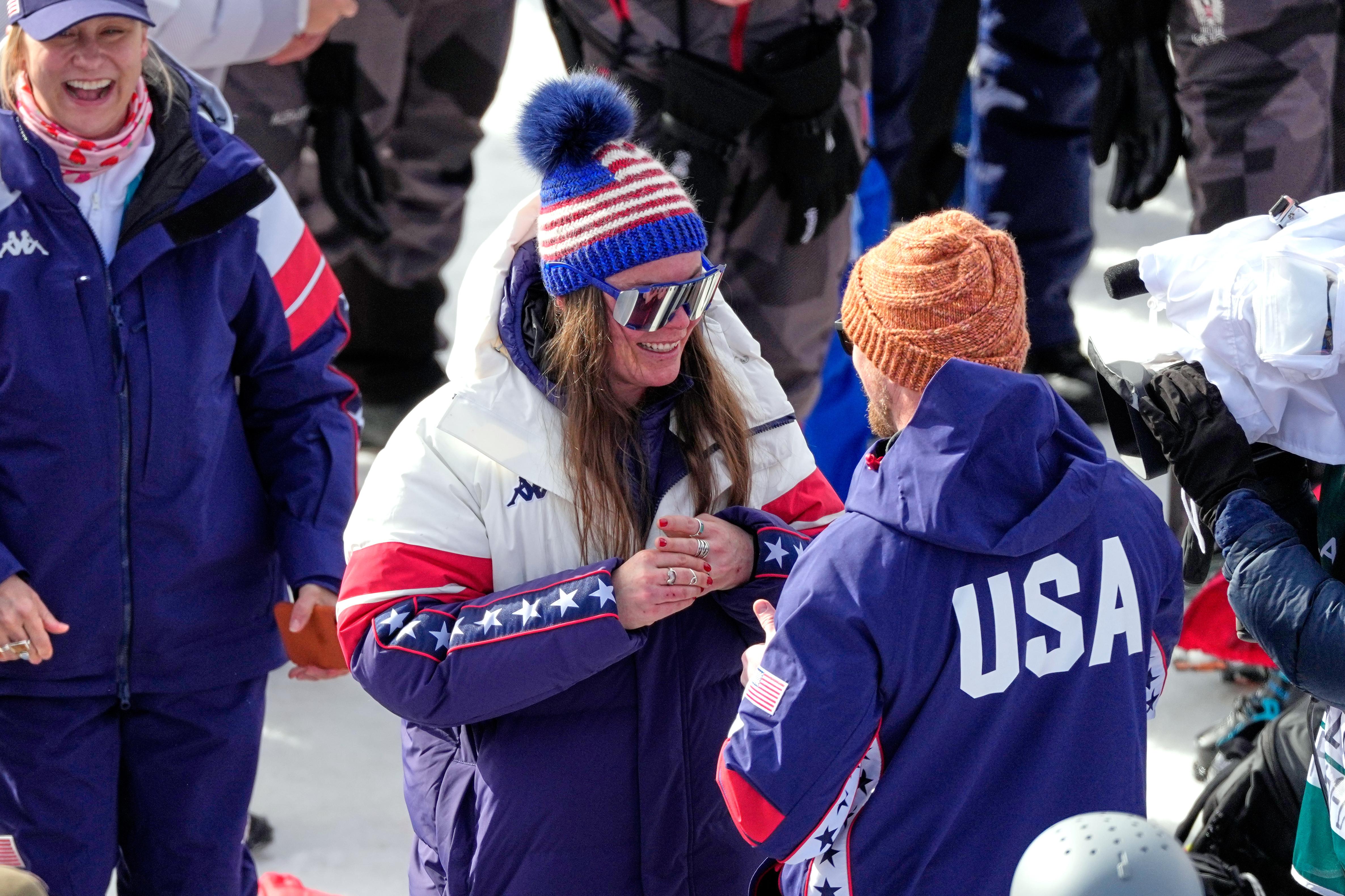 United States’ Breezy Johnson touches the engagement ring she was...