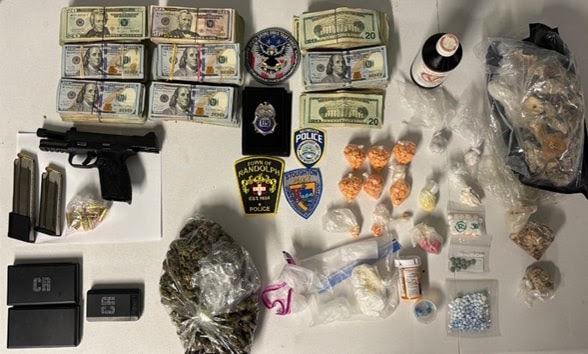 Police seized a large cache of drugs, money and weapons. (Randolph Police Department photo)