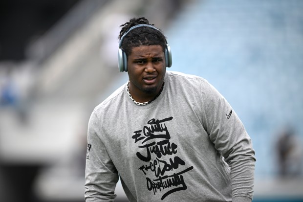 New York Jets defensive tackle Leonard Taylor III warms up before an NFL football game against the Jacksonville Jaguars, Sunday, Dec. 15, 2024, in Jacksonville, Fla. (AP Photo/Phelan M. Ebenhack)