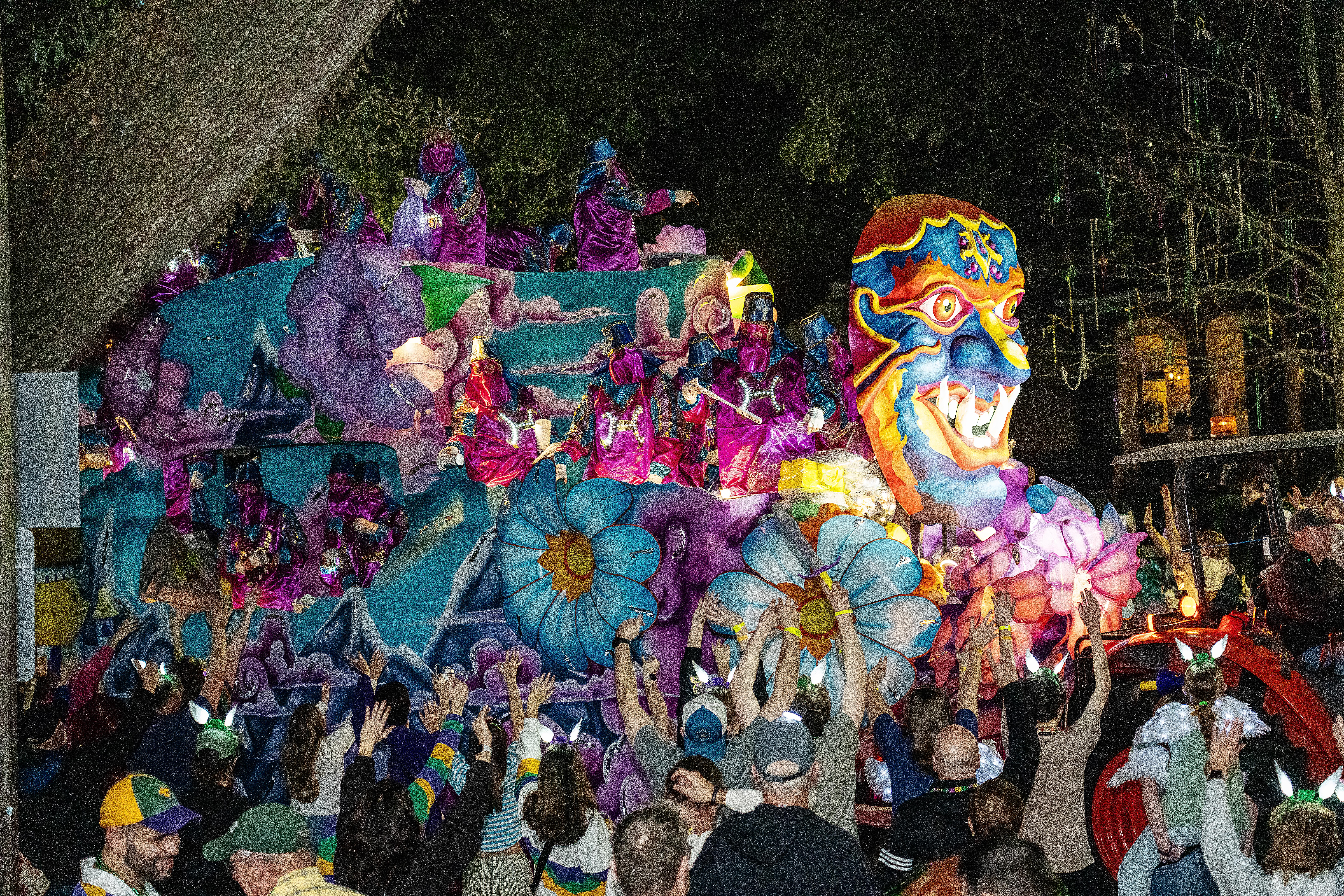 Attendees participate in the annual Krewe of Hermes Parade during...