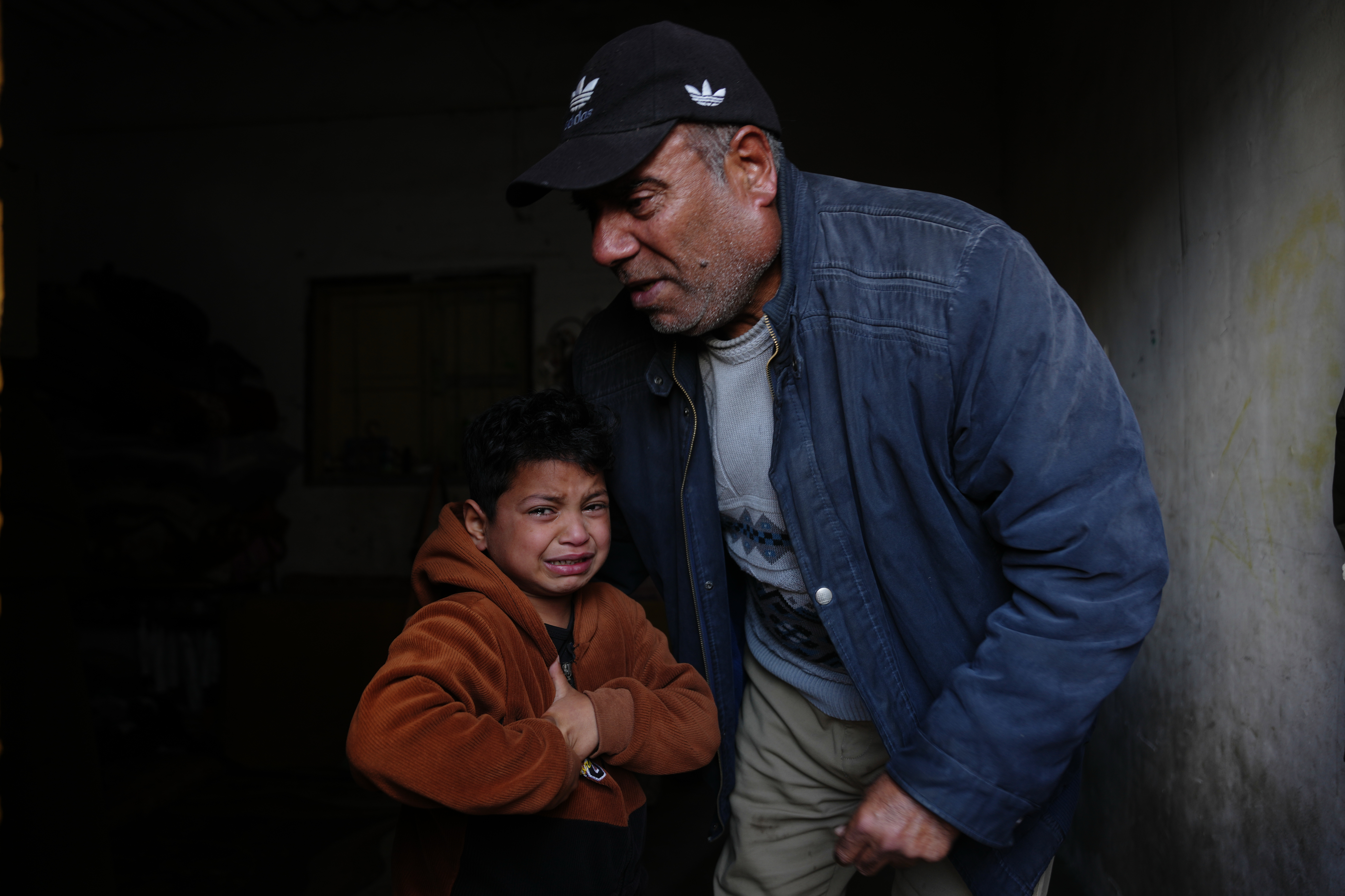 Yazid Al-Zayan mourns during the funeral of his father Khaled Al-Zayan.