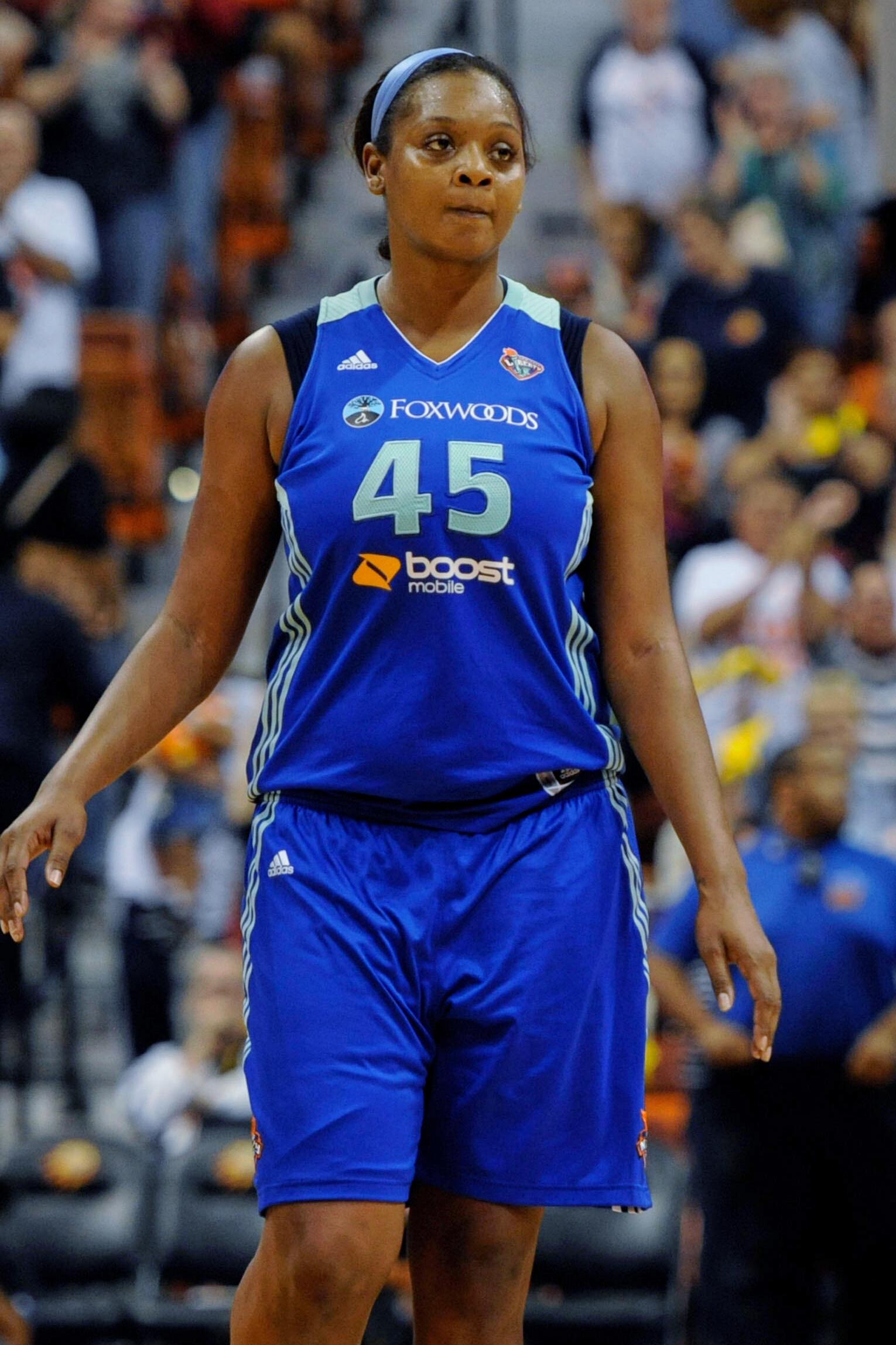 FILE – New York Liberty’s Kara Braxton walks on the...