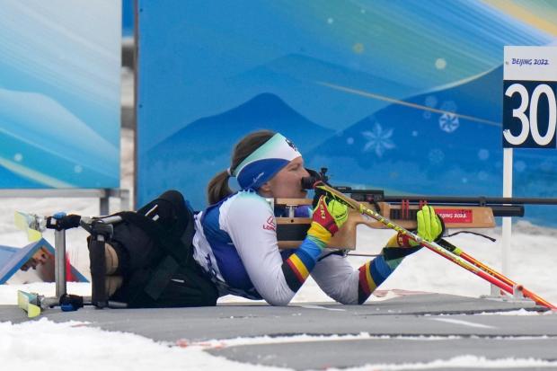 Anja Wicker of Germany shoots during the women's individual sitting event of para biathlon.