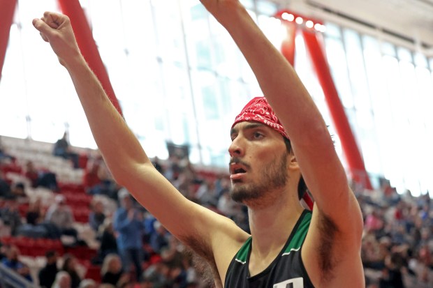 Danny Garrison, of Parker Charter, wins the 1,000m at the Div. 5 indoor track championships. (Staff photo by Stuart Cahill)