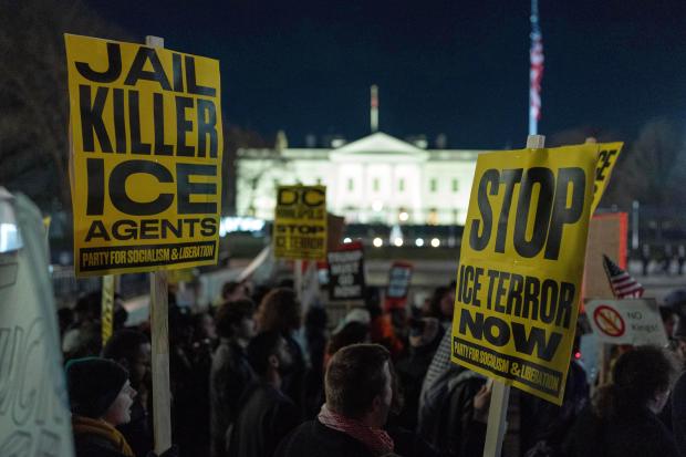 Demonstrators protest outside the White House in Washington, Thursday, Jan. 8, 2026, against the Immigration and Customs Enforcement (ICE) agent who fatally shot Renee Nicole Good in Minneapolis. (AP Photo/Jose Luis Magana)