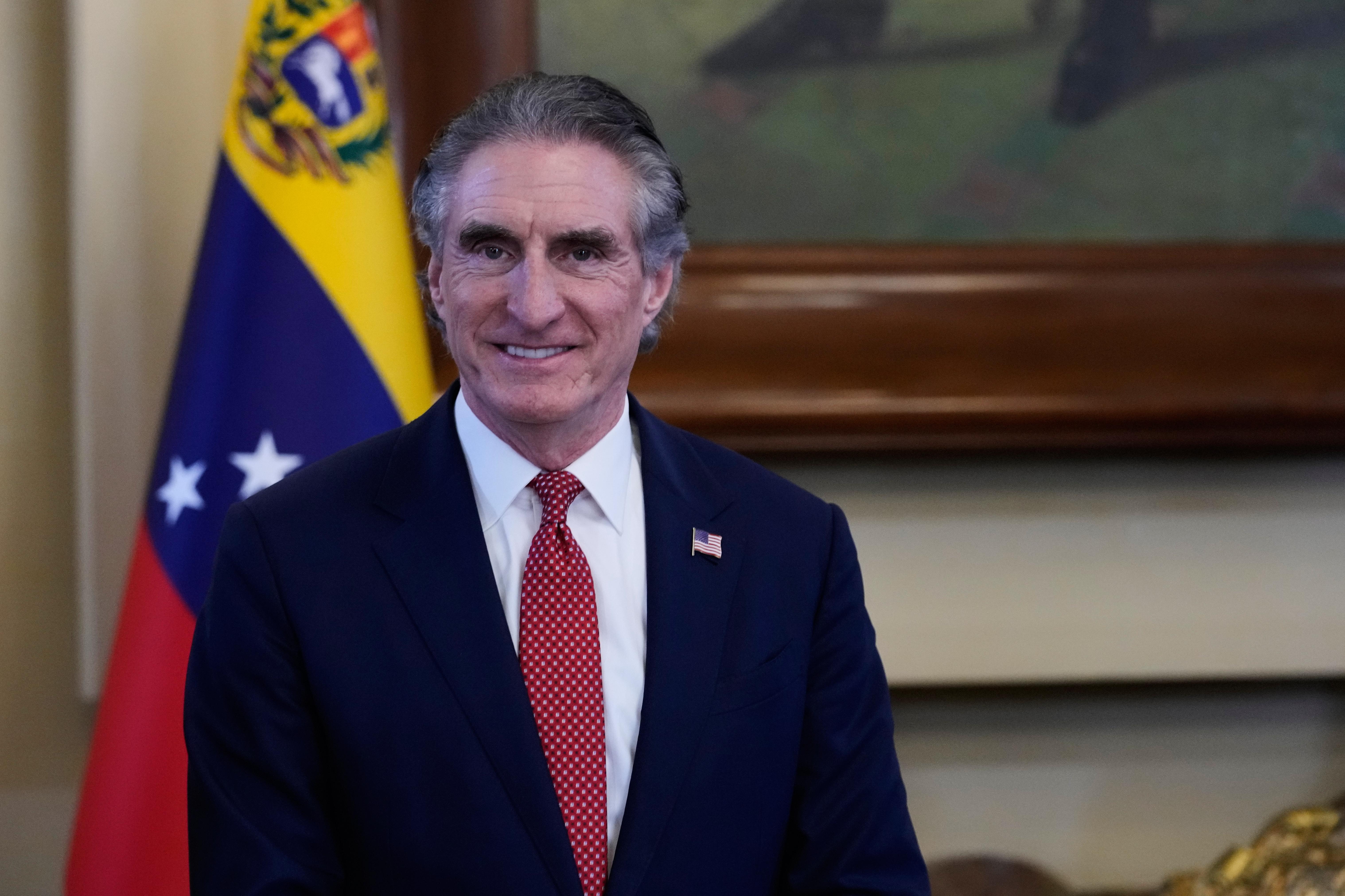Interior Secretary Doug Burgum smiles during a meeting with Venezuela's acting President Delcy Rodriguez.