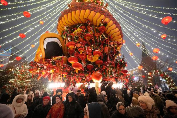 People attend the Lunar New Year festival at Manezhnaya Square