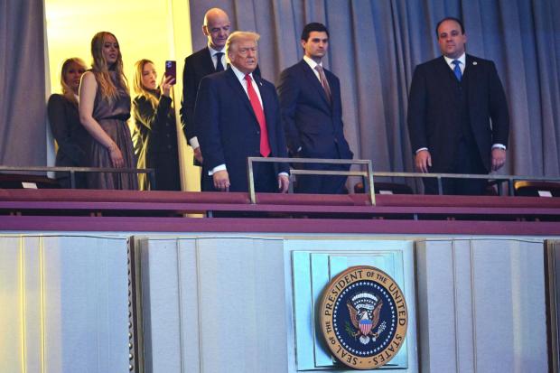 President Donald Trump, FIFA President Gianni Infantino and Tiffany Trump, left, arrives at the Presidential box seats for the draw for the 2026 soccer World Cup at the Kennedy Center in Washington, Friday, Dec. 5, 2025. (Mandel Ngan/Pool Photo via AP)