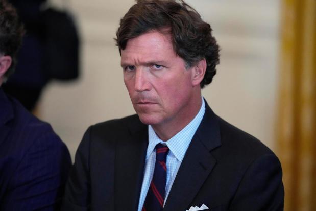 Tucker Carlson attends a meeting with President Donald Trump and oil executives.