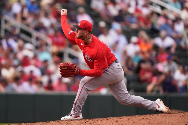 Boston Red Sox pitcher Zack Kelly delivers in the fourth inning of a spring training baseball game against the Atlanta Braves in North Port, Fla., Friday, Feb. 27, 2026. (AP Photo/Gerald Herbert)