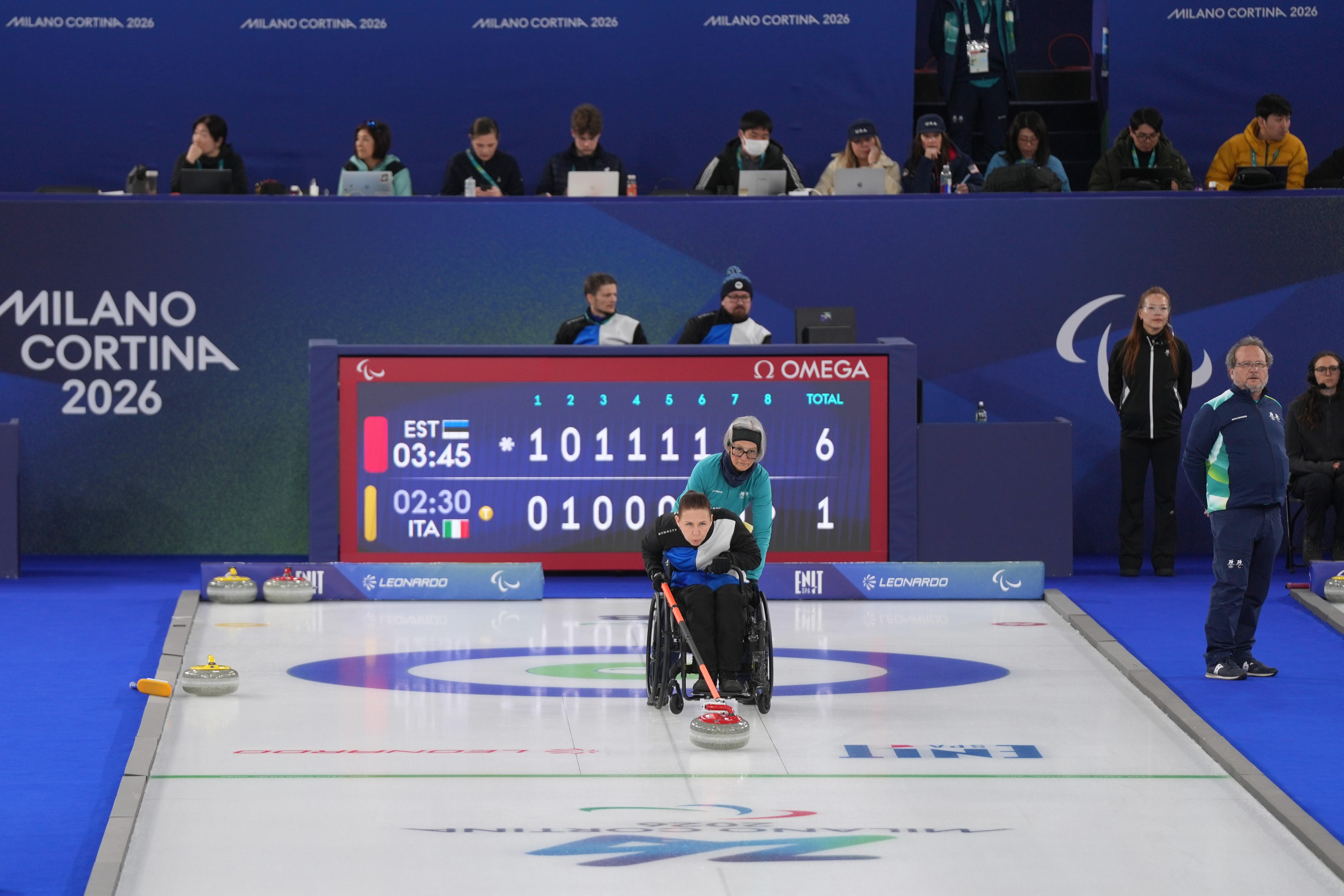 Katlin Riidebach, of Estonia, competes in a wheelchair curling mixed...