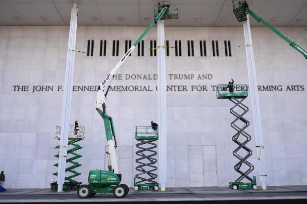 New signage, The Donald J. Trump and The John F. Kennedy Memorial Center For The Performing Arts, is unveiled on the Kennedy Center, Friday, Dec. 19, 2025, in Washington. (AP Photo/Jacquelyn Martin)