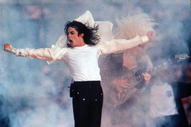 FILE - Michael Jackson performs during the halftime show at the Super Bowl in Pasadena, Calif., on Feb. 1, 1993. (AP Photo/Rusty Kennedy, File)