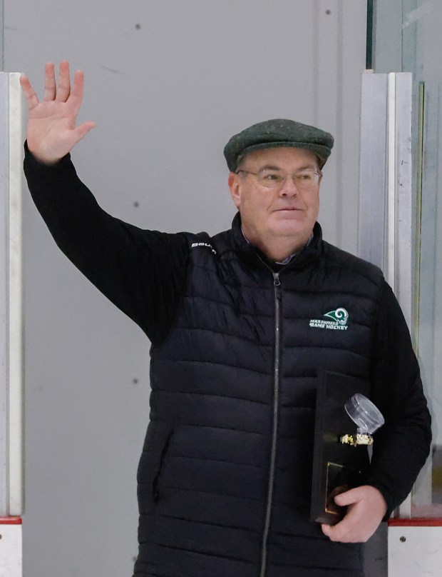 Marshfield coach Dan Connolly waves to well-wishers after earning his 400th career win against Plymouth South January 17, 2026, in Kingston, Massachusetts. (Photo by Paul Connors/Media News Group/Boston Herald)
