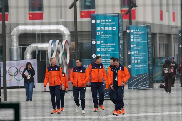 Athletes from the Netherlands walk in the Olympic Village ahead of the 2026 Winter Olympics, in Milan, Italy, Friday, Jan. 30, 2026. (AP Photo/Luca Bruno)