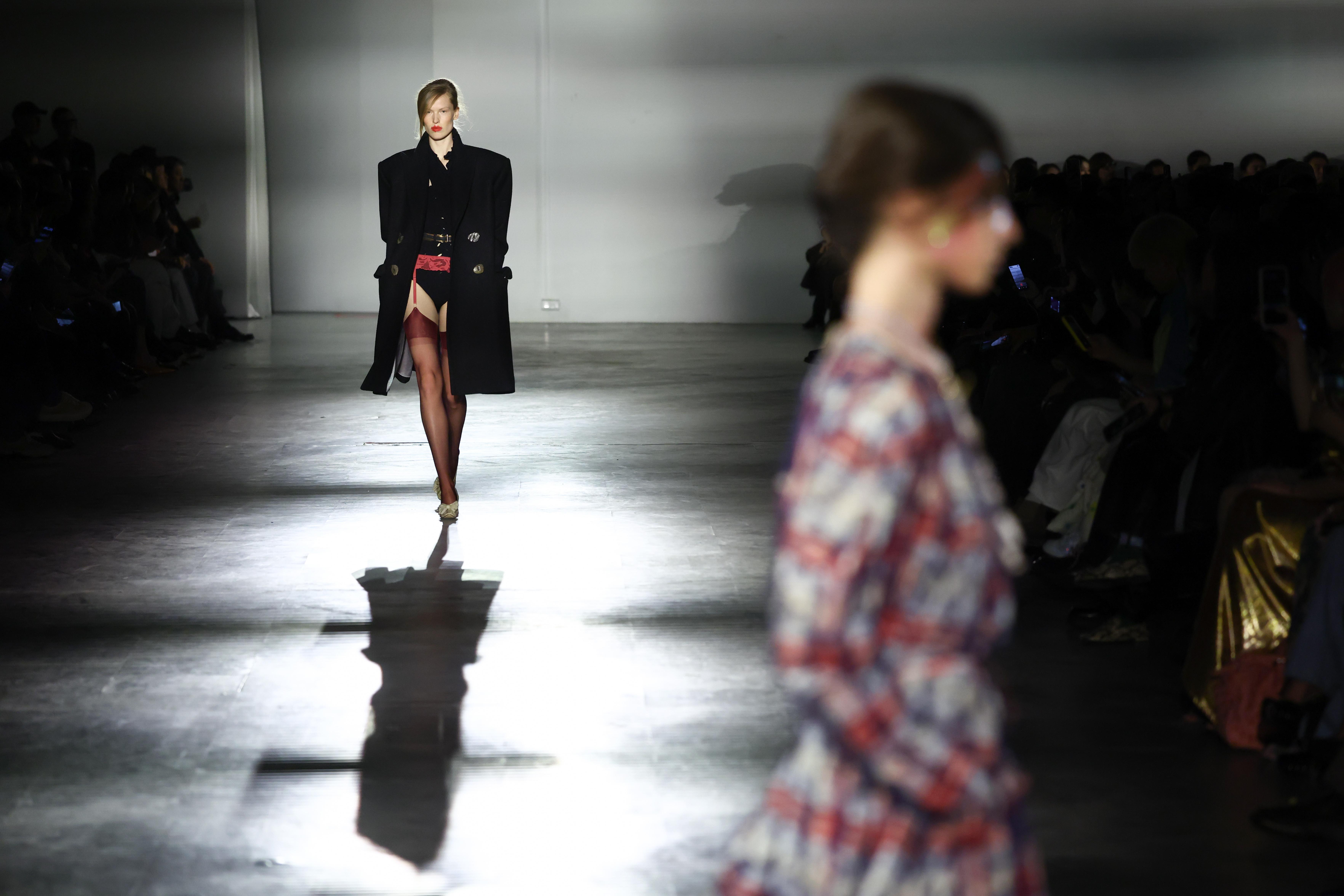 A model wears a creation from the Vivienne Westwood Fall/Winter...