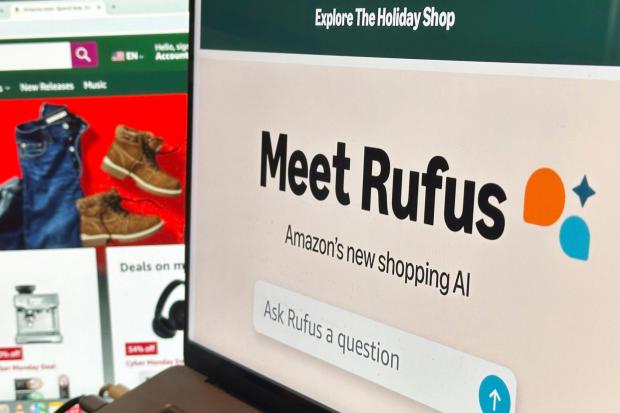 FILE - Amazon's generative AI-powered shopping assistant, Rufus, appears on a computer monitor, Dec. 1, 2024, in New York. (AP Photo/Peter Morgan, File)