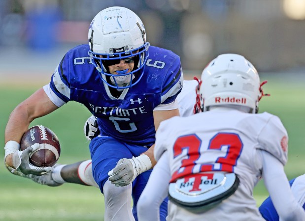 Scituate's Grayson Foley runs for extra yards against Tewksbury during the second half of Saturday's thriller in Foxboro. (Photo By Matt Stone/Boston Herald)