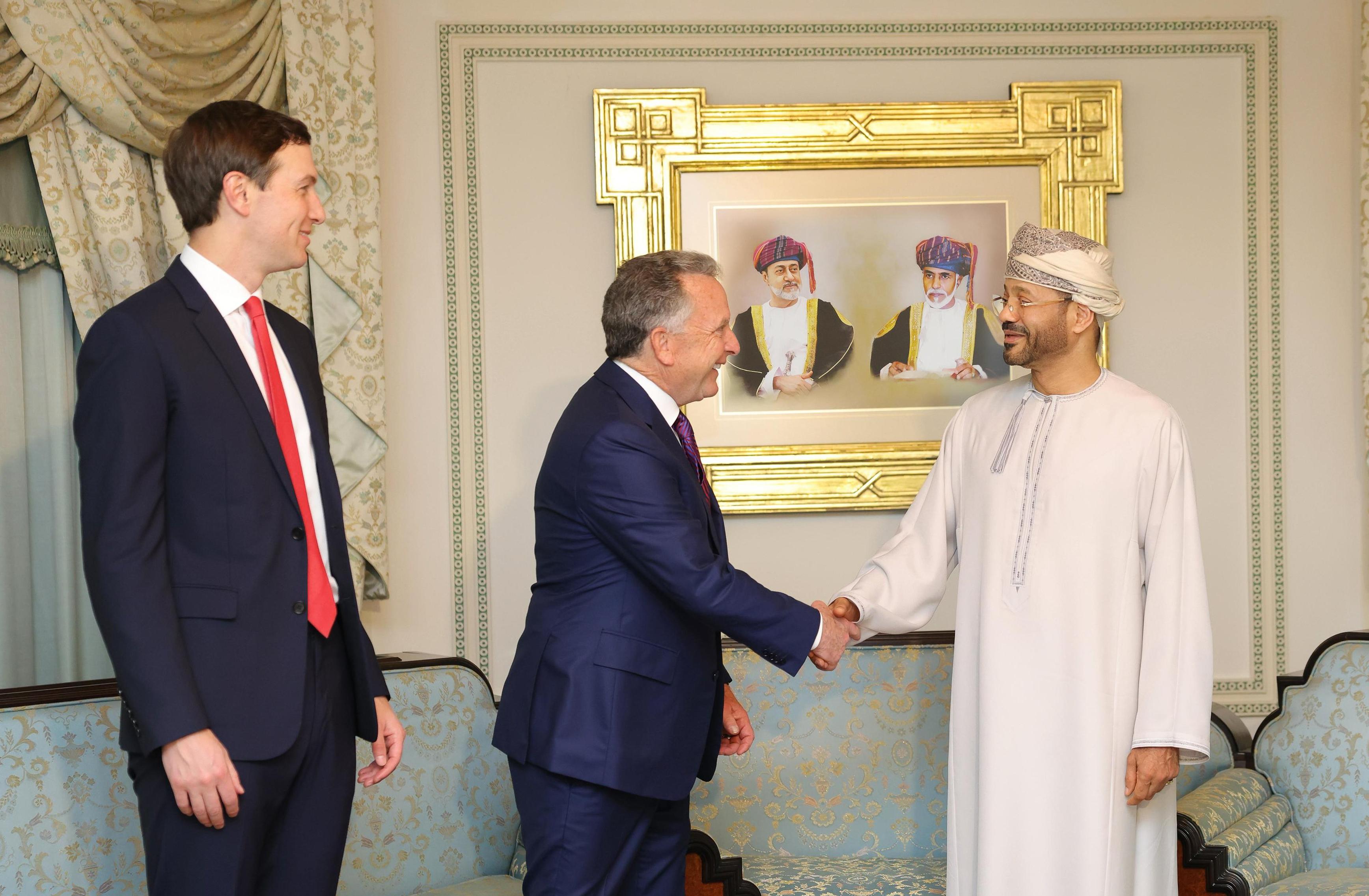 Steve Witkoff, White House special envoy, shakes hands with Oman's Foreign Minister Sayyid Badr Albusaidi, accompanied by Jared Kushner.
