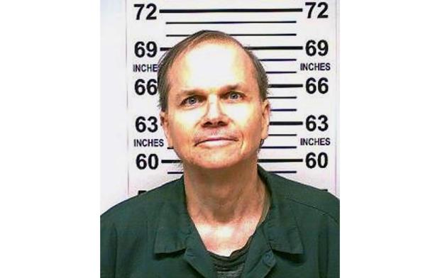 FILE - This photo provided by the New York State Department of Corrections shows Mark David Chapman, the man who shot and killed John Lennon outside his Manhattan apartment building in 1980, Jan. 31, 2018. (New York State Department of Corrections via AP, File)