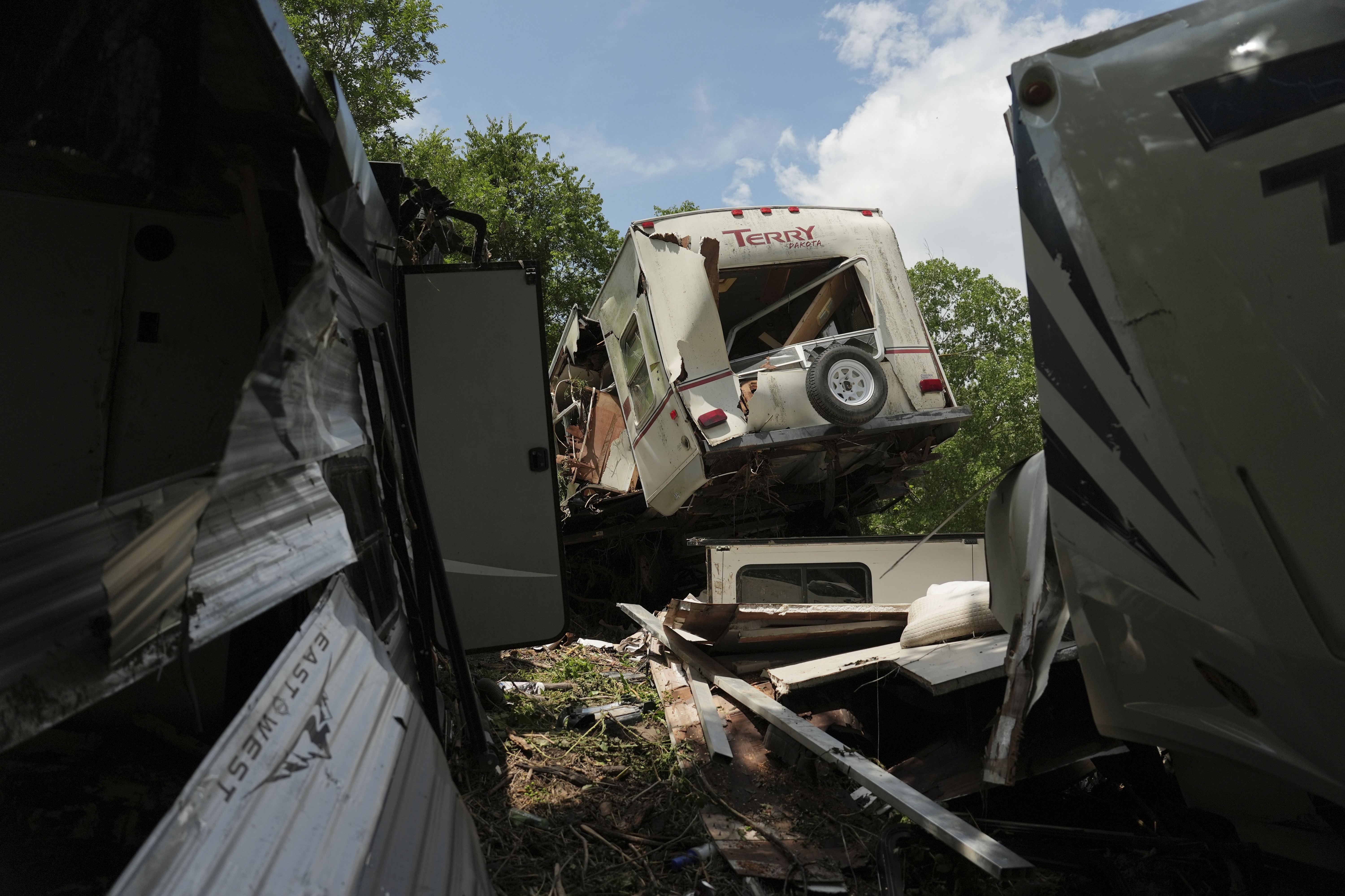 Damage from recent flooding is visible Wednesday, July 9, 2025,...