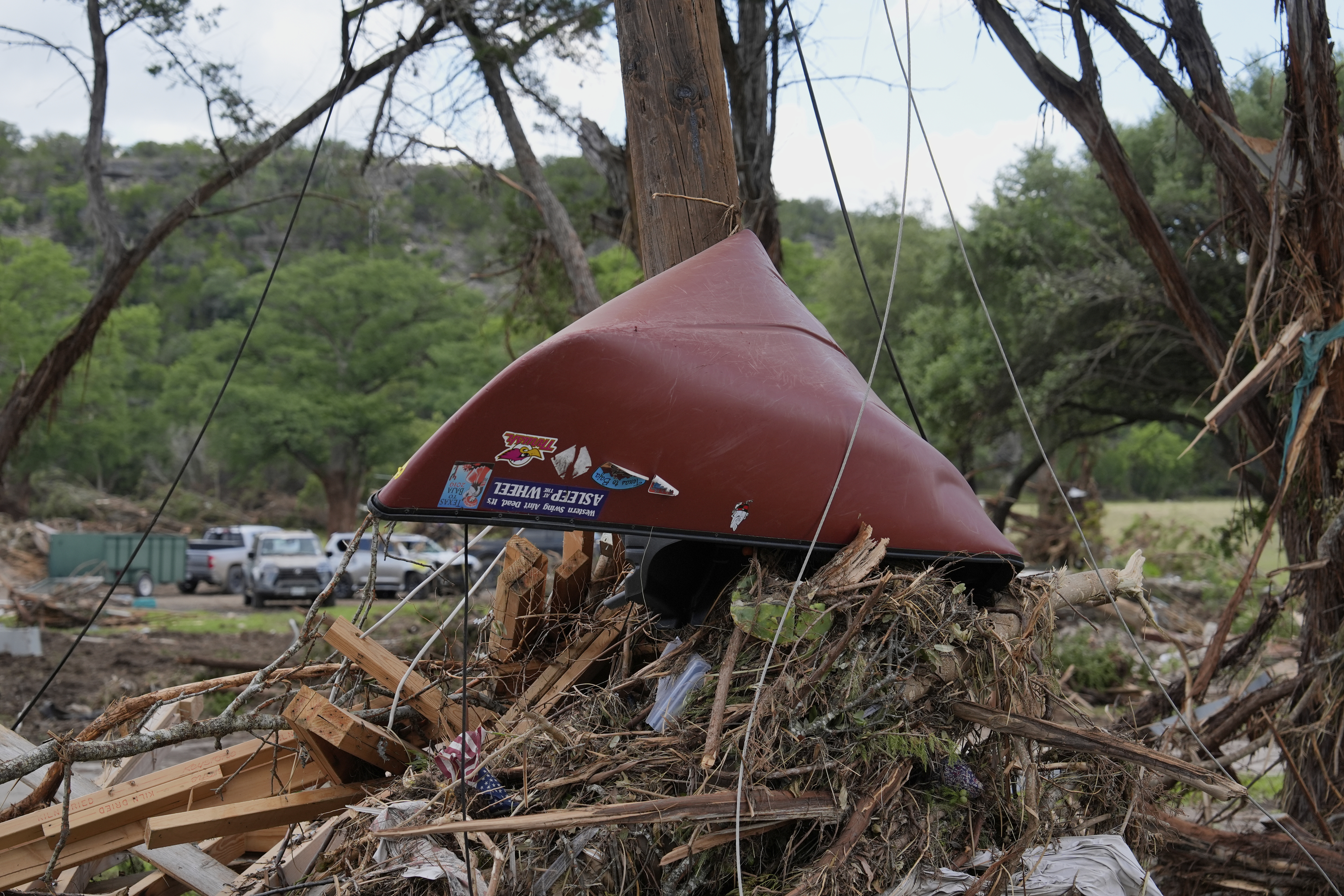Debris covers the ground after a flood in Hunt, Texas...