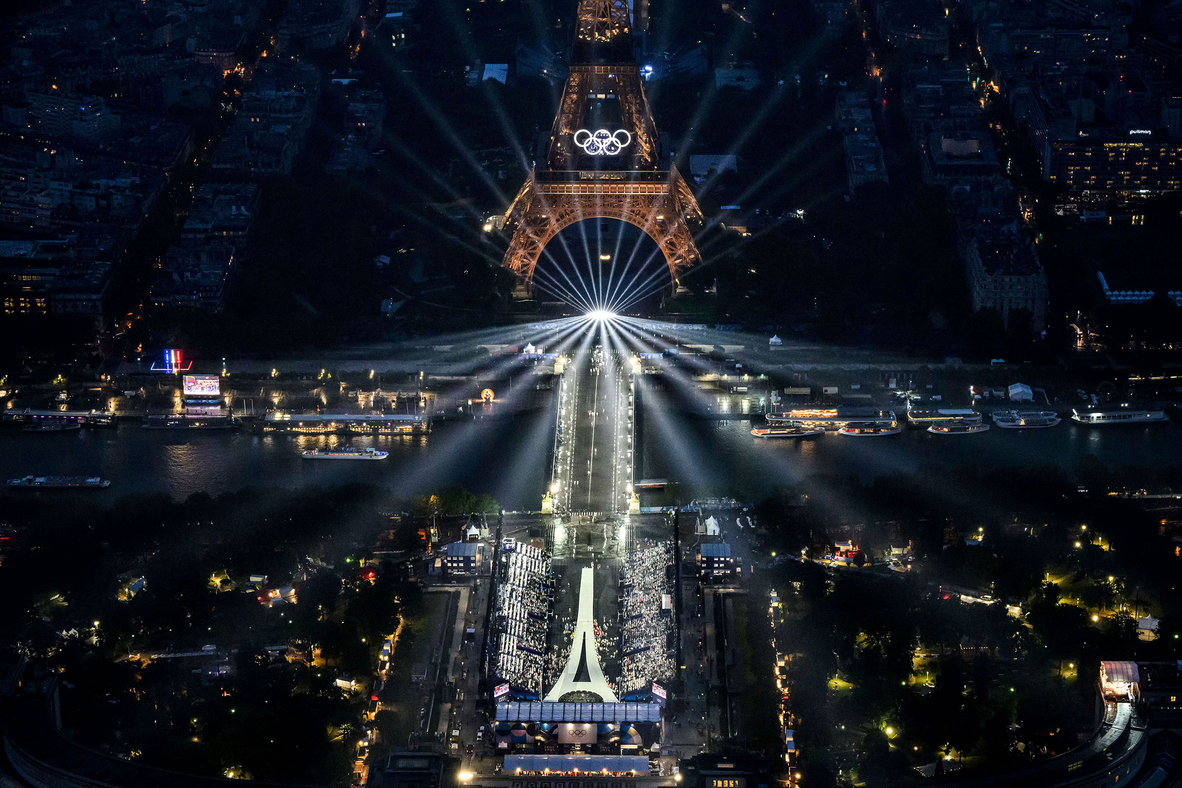 The Eiffel Tower and the Olympics rings are lit up during the opening ceremony for the 2024 Summer Olympics in Paris, France, on July 26, 2024.