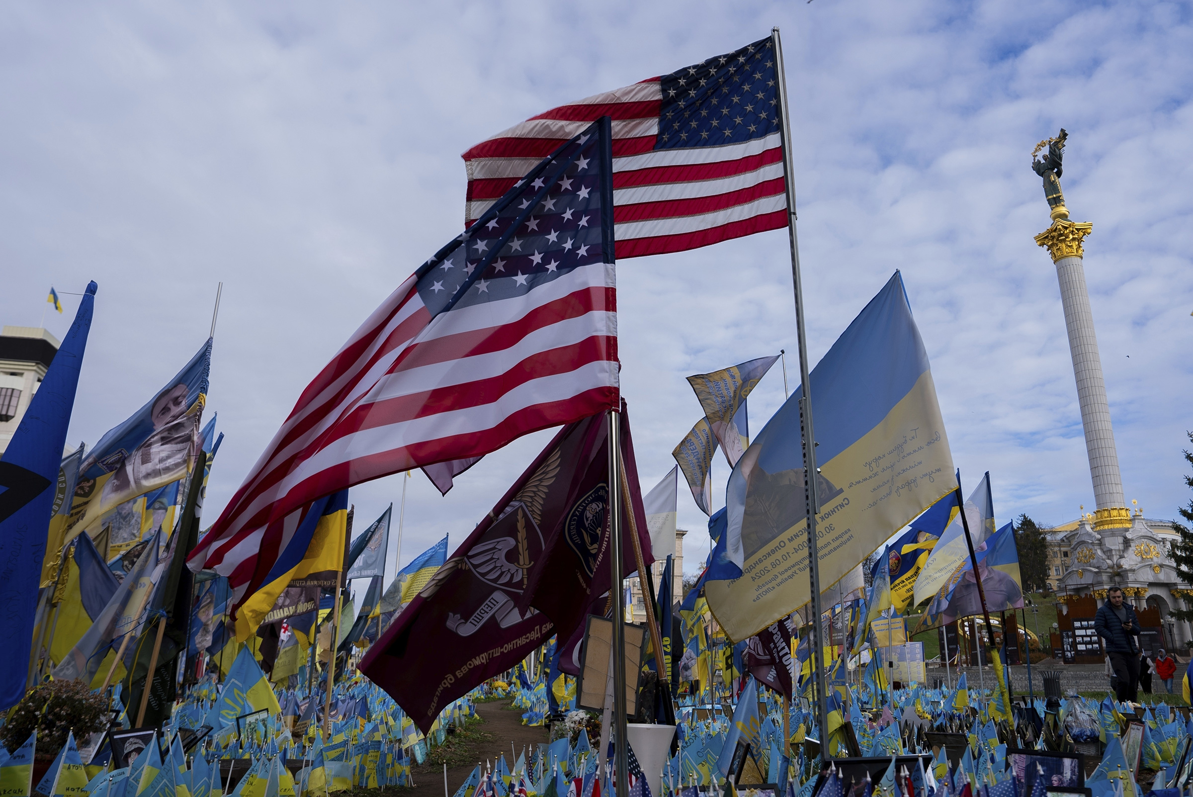 American and Ukrainian flags placed in honour of fallen servicemen are displayed in Kyiv, Ukraine, Nov. 5, 2024.