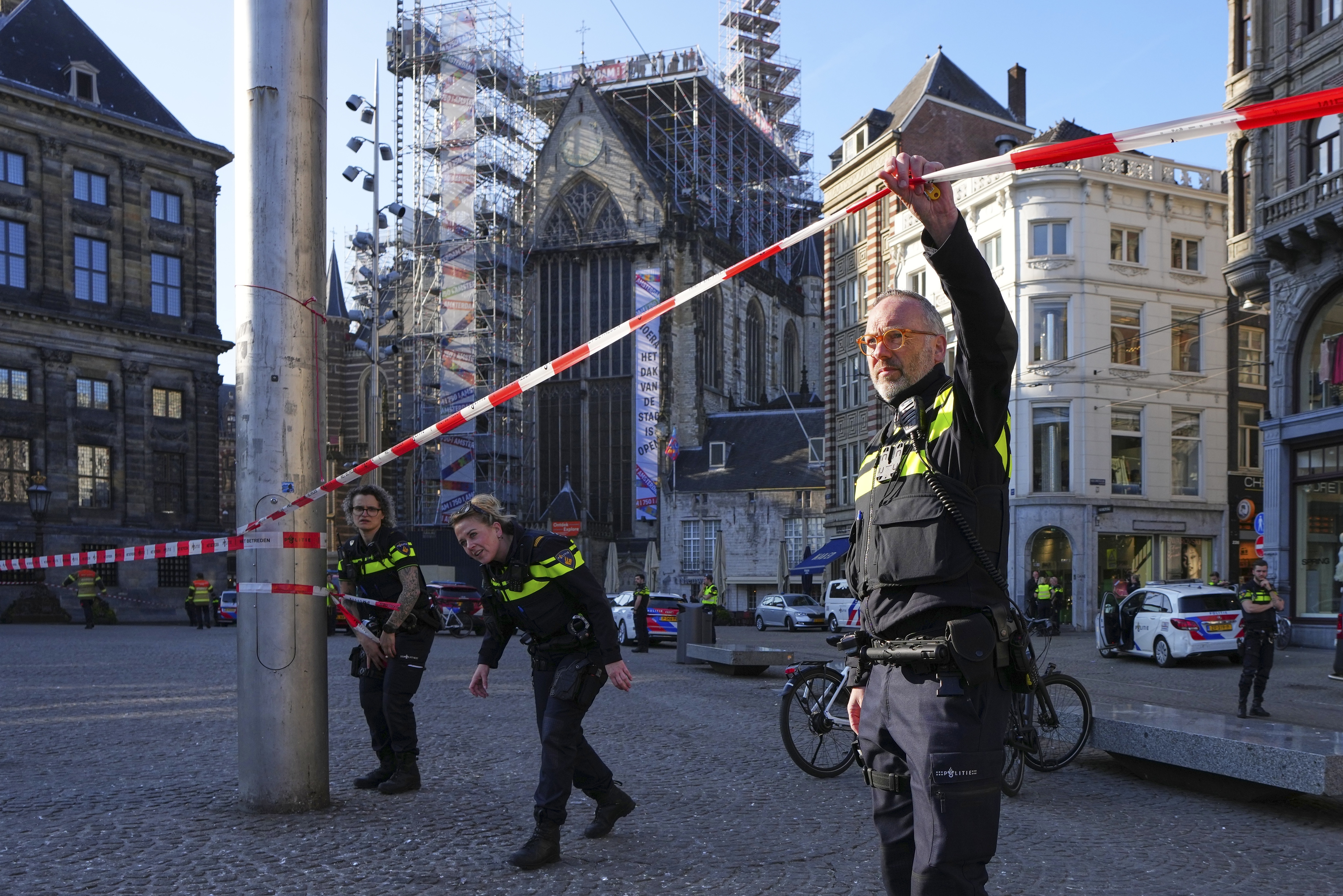 Police officers cordoning off an area in Amsterdam.