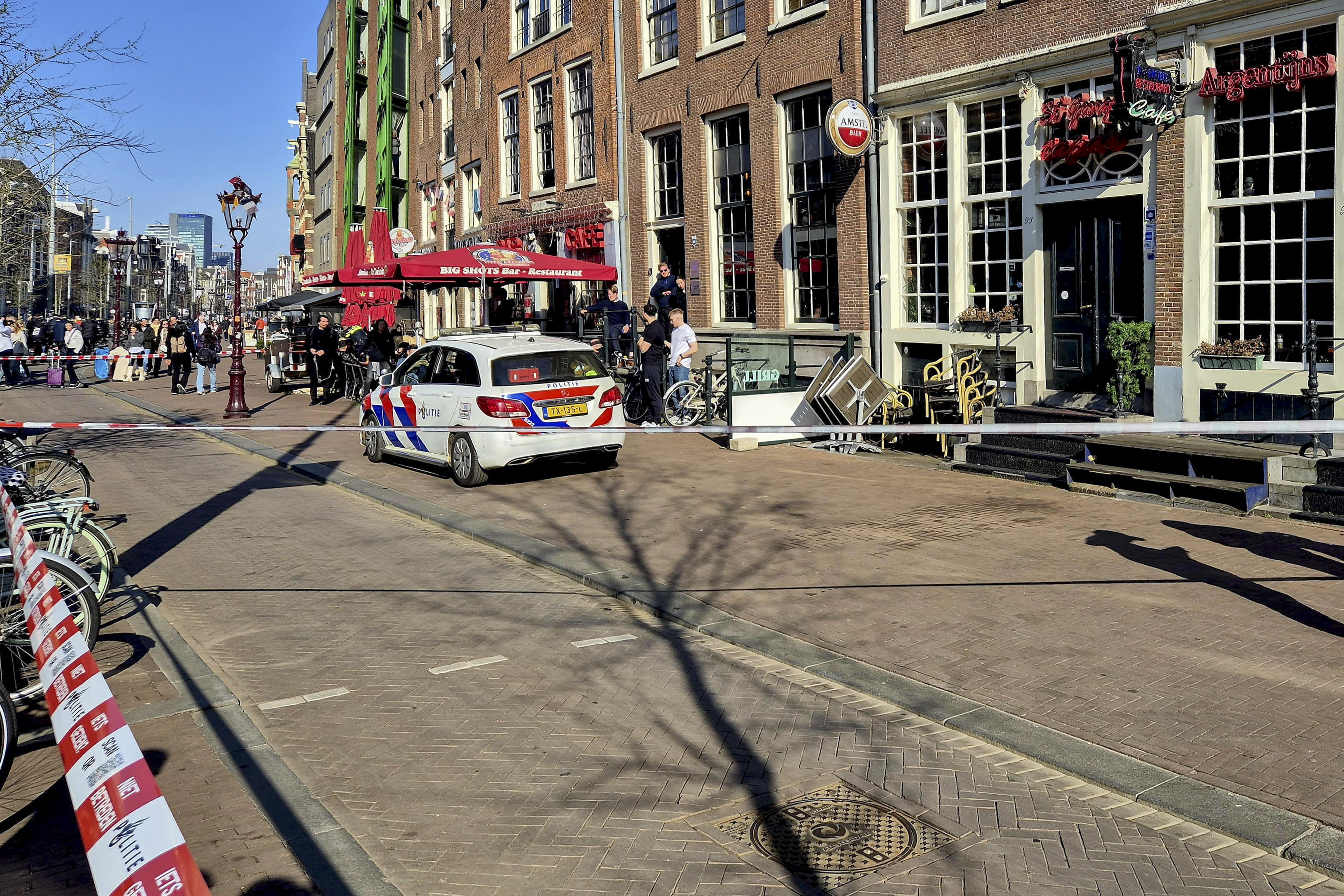 Police at the scene of a stabbing in Amsterdam.