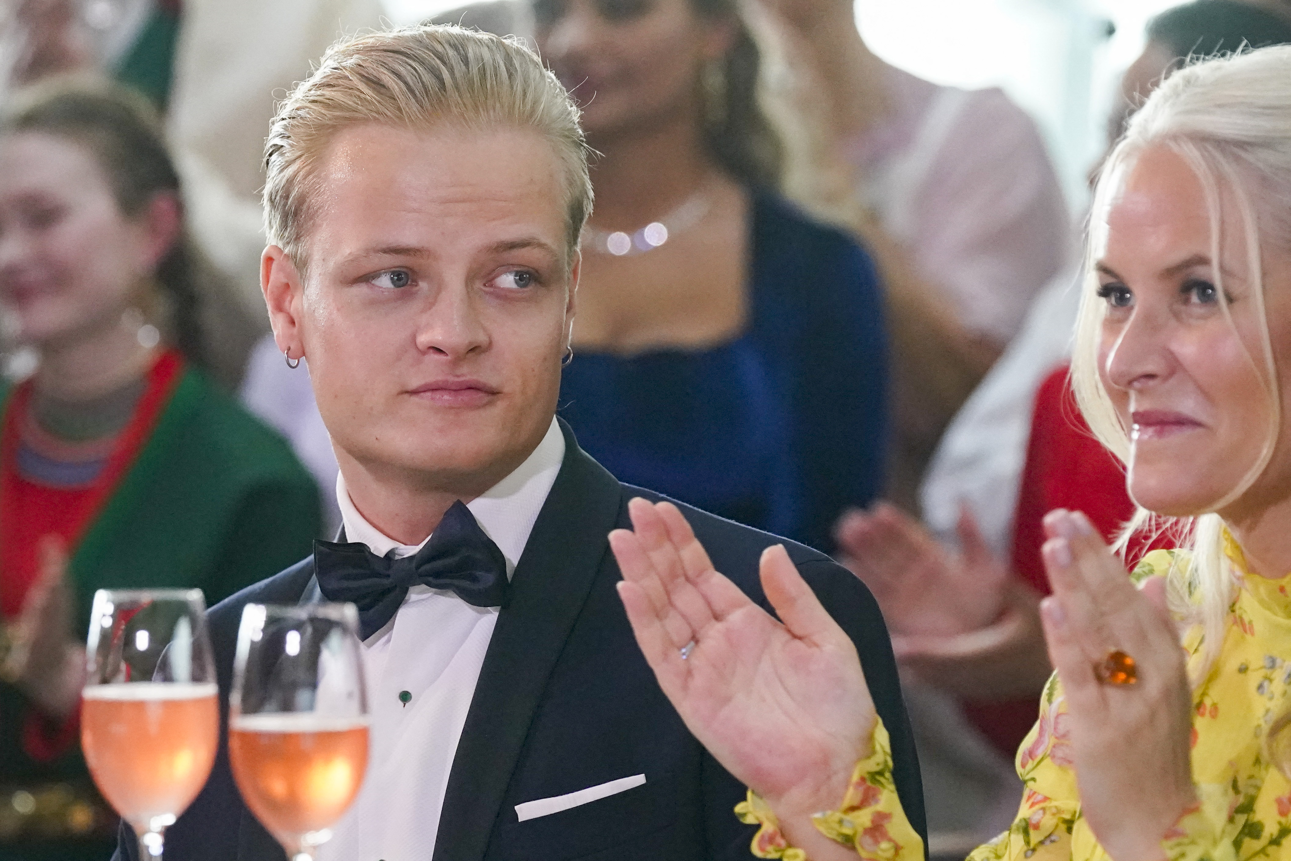 Marius Borg Høiby and his mother, Crown Princess Mette-Marit, at an event.