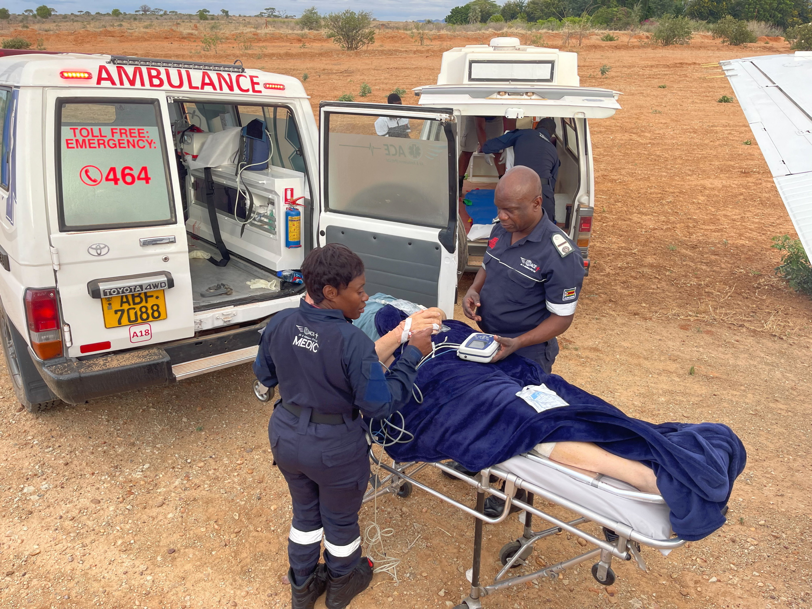 Roland being put in an ambulance