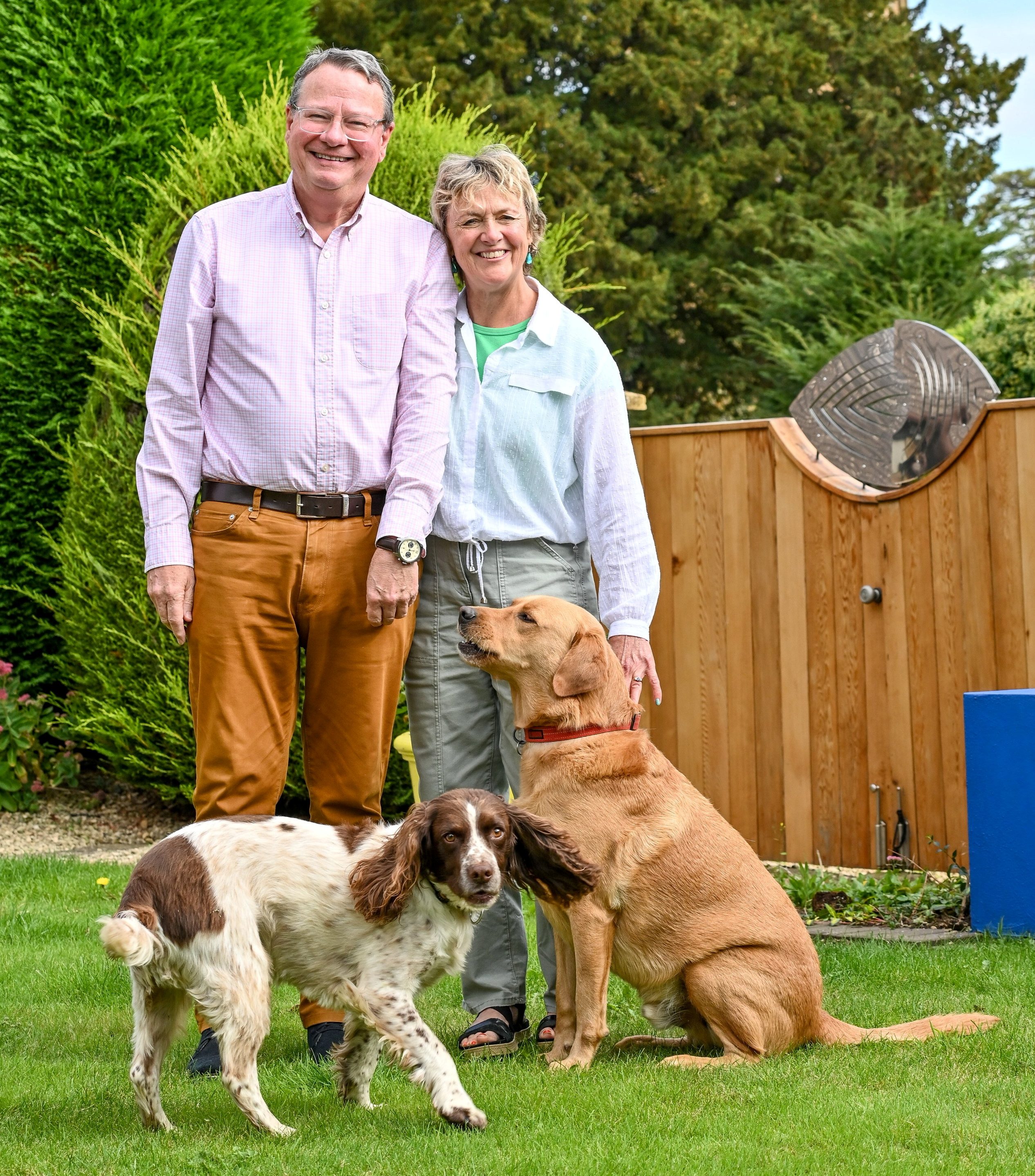 The couple with their two dogs at their home in Tysoe (Picture: SWNS)