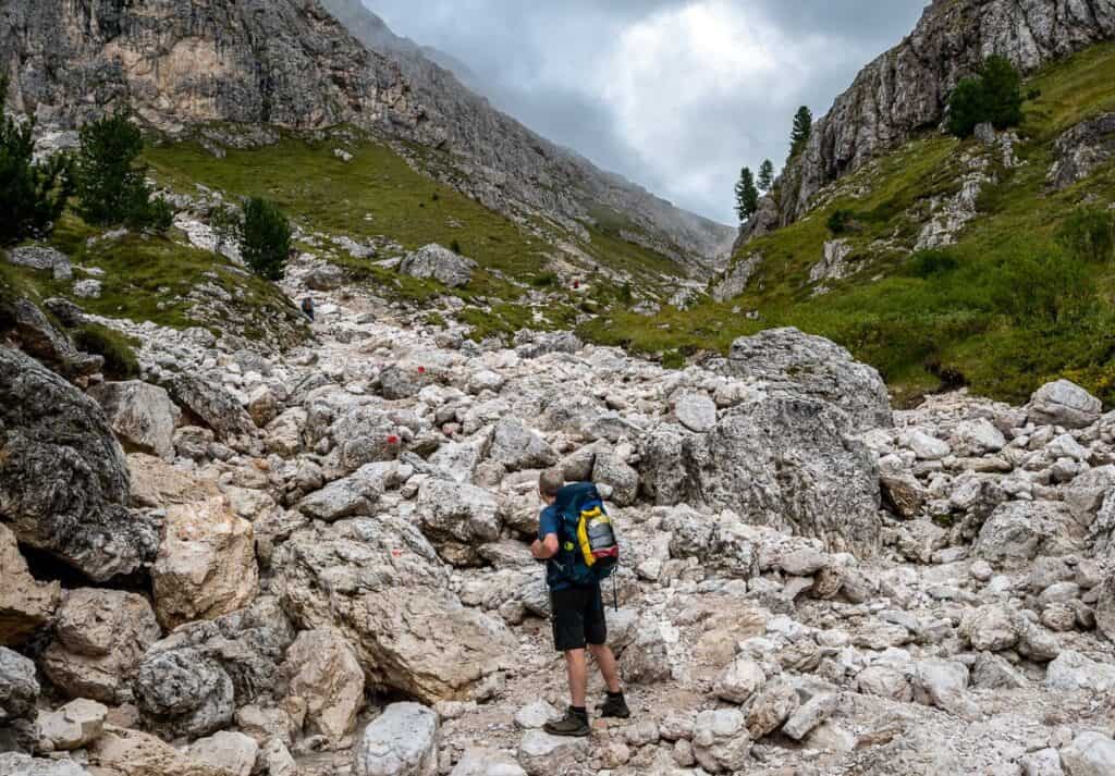 Rocky hiking with painted red circles leading the way