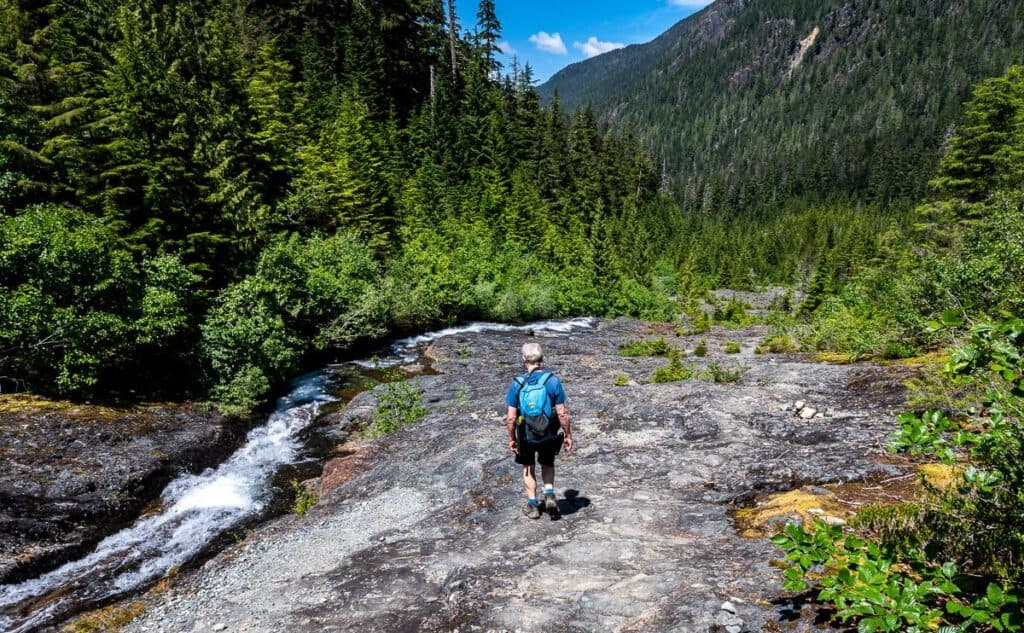 Picture is of the descent BUT immediately after crossing the bridge (not seen here) turn right and head up the creek on the rocks