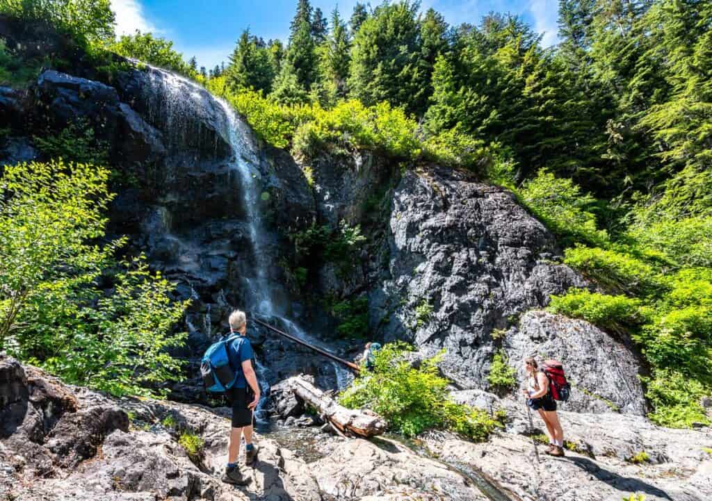 A refreshing stop at this small waterfall after the hike to Landslide Lake