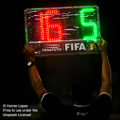 "Fourth Official" making substitution during a match