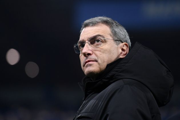 Damien Comolli looking on