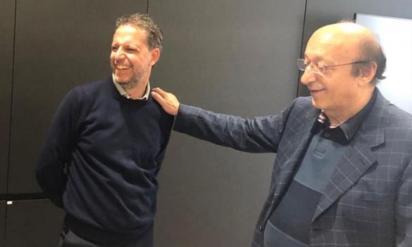 Moggi sharing a laugh with fellow former Juventus director Paratici