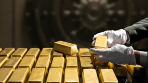 Gold surged past $5,000 an ounce for the first time on Monday as investors piled into safe-haven assets amid a weakening dollar, renewed currency market volatility and escalating geopolitical tensions.